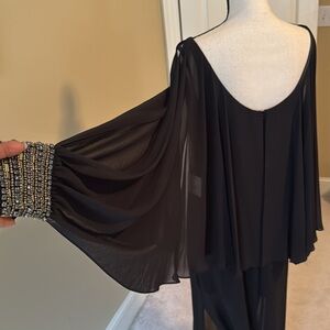 Black chiffon gown by Laundry. Size 6. NWT.